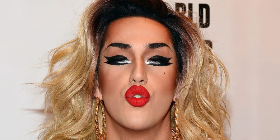 LAS VEGAS, NV - MAY 19:  Cast member of season six of RuPauls Drag Race Adore Delano blows a kiss as she arrives at a viewing party for the shows finale at the New Tropicana Las Vegas on May 19, 2014 in Las Vegas, Nevada.  (Photo by Ethan Miller/Getty Images)