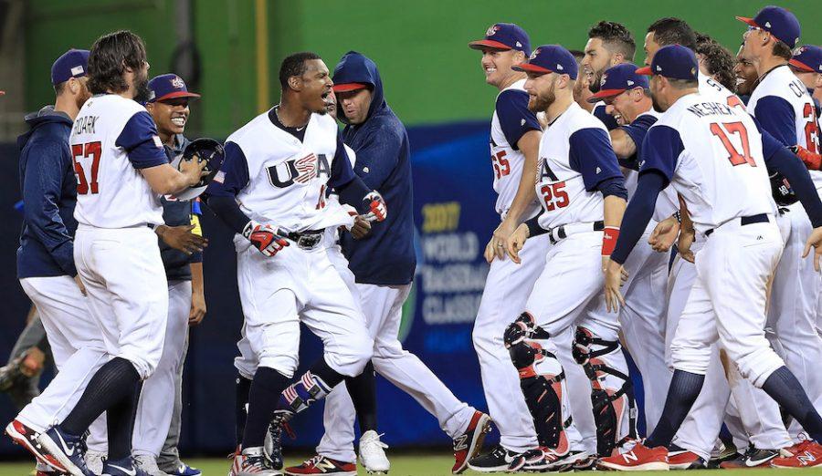 MIAMI, FL - MARCH 10:  Adam Jones #10 of the United States celebrates a walk off RBI single in the 10th inning during a Pool C game of the 2017 World Baseball Classic against Comubia at Miami Marlins Stadium on March 10, 2017 in Miami, Florida.  (Photo by Mike Ehrmann/Getty Images)